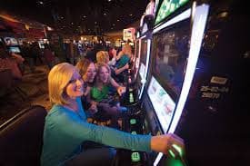 Live-dealer studio at kacang99 login showing multiple blackjack and roulette tables